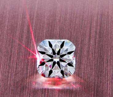 Image of cushion cut diamonds with hearts and arrows patterning